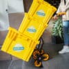 3 reusable boxes on a dolly from Banana Box